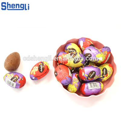 Machine d'emballage en forme d'œuf en forme de boule de chocolat avec fonction entièrement automatique