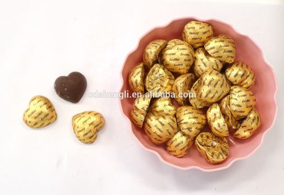 Machine d'emballage en feuille de chocolat en forme d'œuf à bille ronde pour matériaux d'emballage en papier