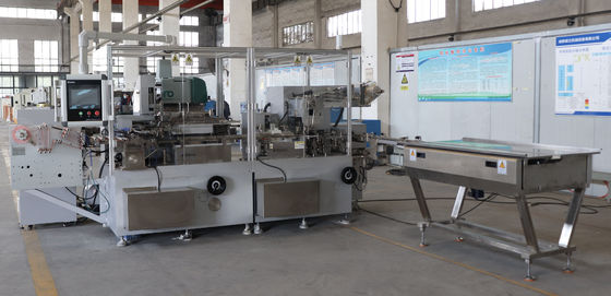 Machine d'emballage de comprimés de chocolat avec enveloppe à double couche étanchéité thermique et colle
